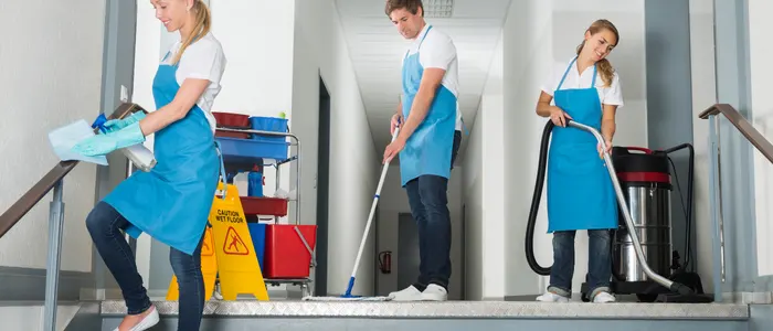 Team Cleaning Office Space Together